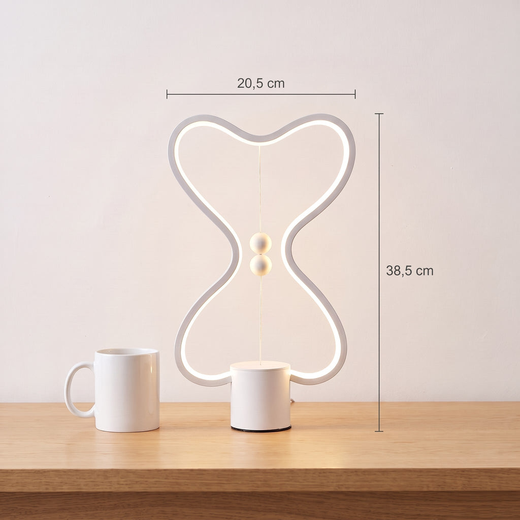 Medidas de Equa: 20,5 cm de ancho y 38,5 cm de alto