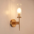 Vela, aplique de pared de latón con cristal estriado encendido